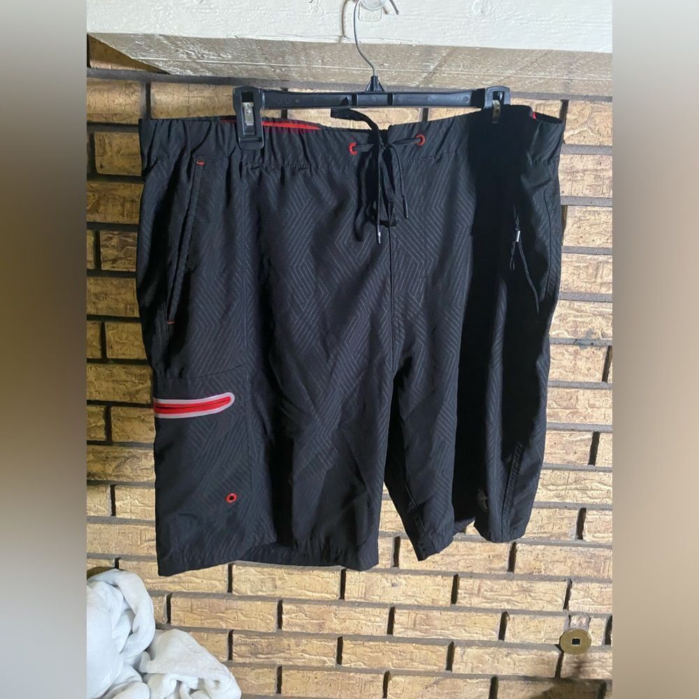 Black
with red accents swim shorts‎